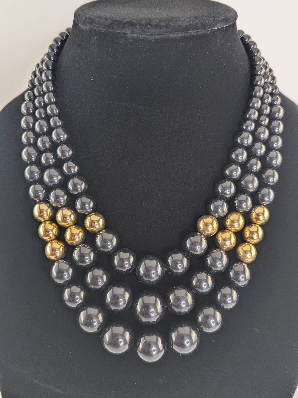 Elegant Hematite and Gold-Tone Multi-Strand Beaded Necklace